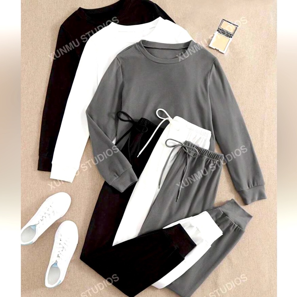 3 piece sweat seat. 3 sweatshirts and 3 sweatpants, Black,grey and white